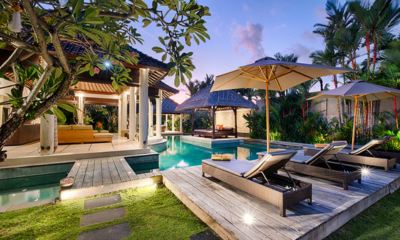 Villa Sesari Pool Side Loungers at Night | Seminyak, Bali