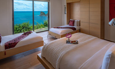 Villa Saengootsa Bedroom Two with a King Bed and Two Single Beds | Phuket, Thailand