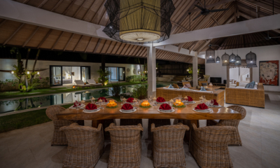 Abaca Villas Villa Nyoman Indoor Dining Area at Night | Seminyak, Bali