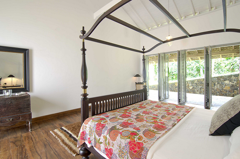 Ivory House Bedroom with Four Poster Bed and Wooden Floor | Galle, Sri Lanka
