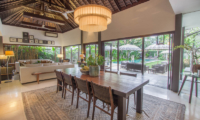Chimera Tiga Indoor Living and Dining Area with Pool View | Seminyak, Bali