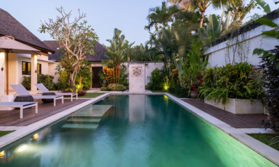 Saba Villas Bali Villa Nakula Pool Side Reclining Sun Loungers at Night | Canggu, Bali
