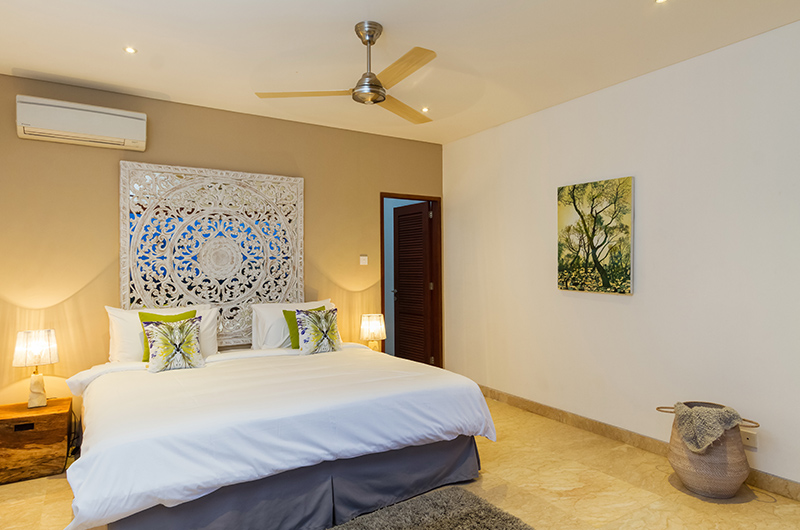 Villa Bayu Bayu Bawah Bedroom One with Painting | Uluwatu, Bali