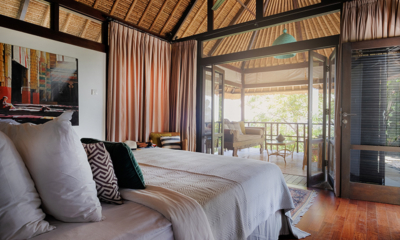 Villa Bayu Bayu Atas Bedroom One and Balcony | Uluwatu, Bali