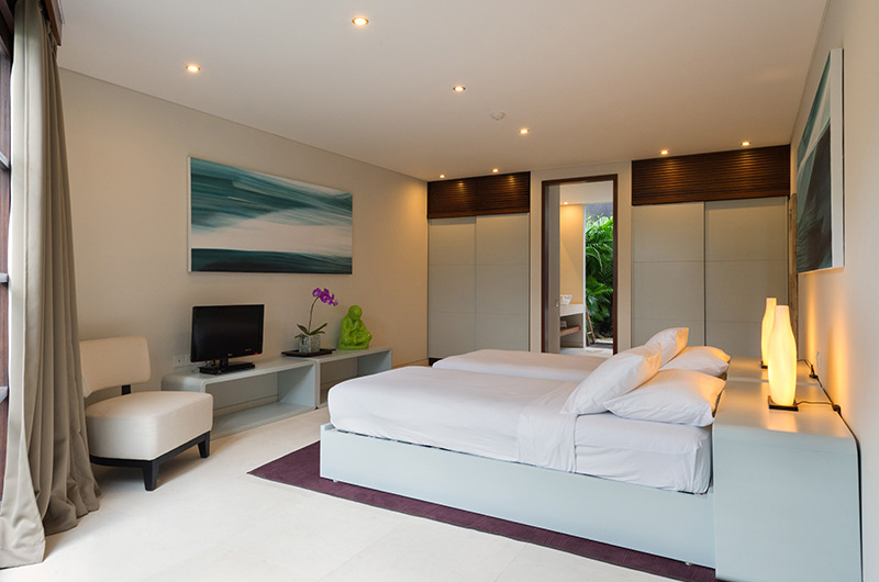 The Layar Four Bedroom Villas Twin Bedroom with TV | Seminyak, Bali The Layar Four Bedroom Villas Twin Bedroom with TV | Seminyak, Bali
