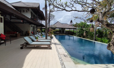 Villa Coraffan Gardens and Pool with Hanging Lamps | Canggu, Bali
