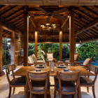 Villa Oost Indies Pool Side Dining Area at Night | Seminyak, Bali