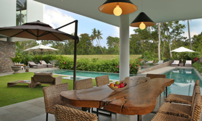 Villa Ashoka Pool Side Dining with Hanging Lamps | Pererenan, Bali