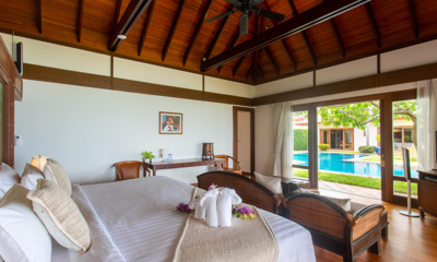 Villa Lotus Bedroom One with Seating Area and Pool View | Maenam, Koh Samui