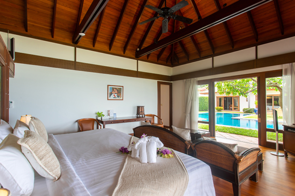 Villa Lotus Bedroom One with Seating Area and Pool View | Maenam, Koh Samui