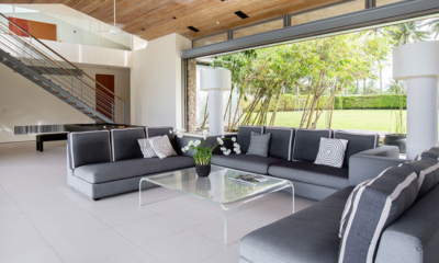 Sava Beach Villas Villa Essenza Living Area with Up Stairs | Natai, Phang Nga
