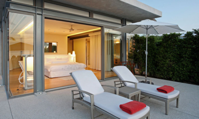 Sava Beach Villas Villa Malee Sai Bedroom and Balcony with Loungers | Natai, Phang Nga