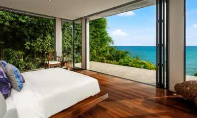 Villa Lomchoy Master Bedroom with Wooden Floor and Sea View | Kamala, Phuket