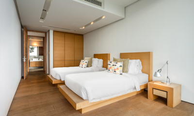 Villa Saengootsa Bedroom Three with Twin Beds and Wooden Floor | Phuket, Thailand