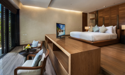 Villa Sawarin Bedroom with TV and Seating Area | Phuket, Thailand