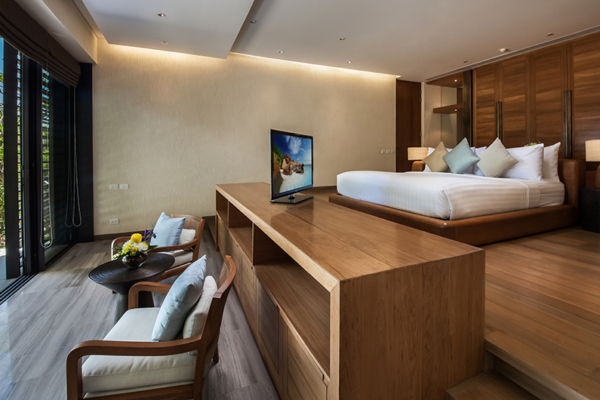 Villa Sawarin Bedroom with TV and Seating Area | Phuket, Thailand