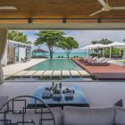 Sava Beach Villas Villa Cielo Indoor Living Area with Pool View | Natai, Phang Nga