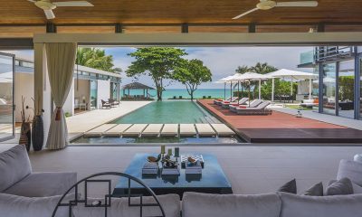 Sava Beach Villas Villa Cielo Indoor Living Area with Pool View | Natai, Phang Nga