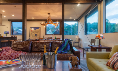 Gustav's Hideaway Living Area with Wine | Hirafu, Niseko