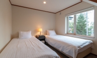 Powder Cottage Twin Bedroom Area | Hirafu, Niseko