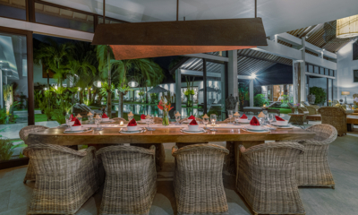 Abaca Villas Villa Iluh Indoor Dining Area at Night | Seminyak, Bali