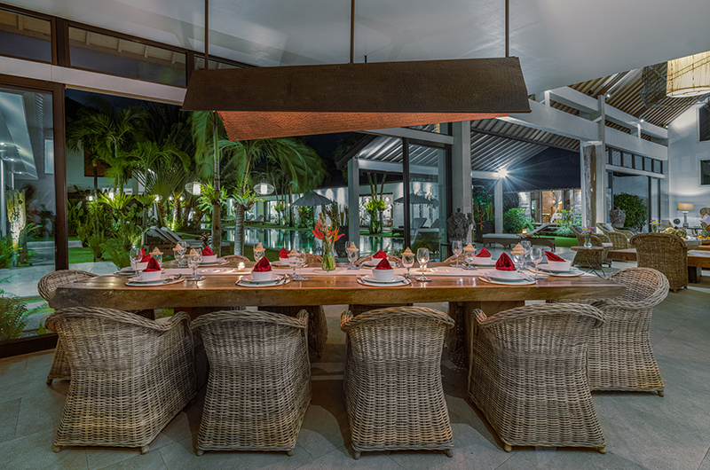 Abaca Villas Villa Iluh Indoor Dining Area at Night | Seminyak, Bali