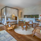 Abaca Villas Villa Iluh Bedroom One with Seating Area | Seminyak, Bali