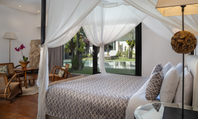 Abaca Villas Villa Iluh Bedroom One with Seating Area and Pool View | Seminyak, Bali