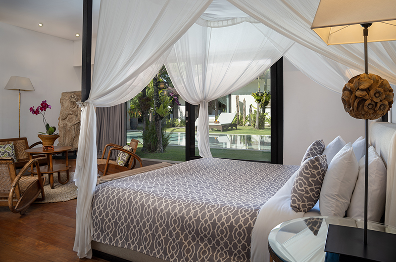 Abaca Villas Villa Iluh Bedroom One with Seating Area and Pool View | Seminyak, Bali