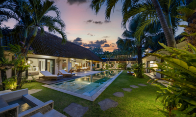 Abaca Villas Villa Nyoman Gardens and Pool at Night | Seminyak, Bali