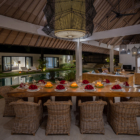 Abaca Villas Villa Nyoman Indoor Dining Area at Night | Seminyak, Bali