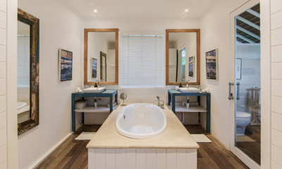 Beach House His and Hers Bathroom with Mirrors | Nusa Lembongan, Bali