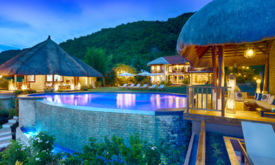 Pure Shores Villa Pool Side Area at Night | Anda, Bohol