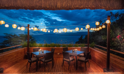 Pure Shores Villa Dining Area at Night with Sea View | Anda, Bohol