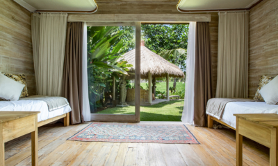 Villa Mannao Bedroom One with Two Extra Single Beds and View | Kerobokan, Bali