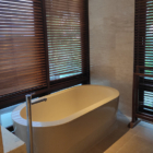 Surga Villa Estate Villa Surga One Suprabha Bathroom with Bathtub | Ungasan, Bali