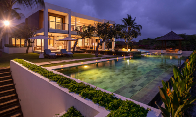 Surga Villa Estate Villa Surga Two Pool Side Area at Night | Ungasan, Bali
