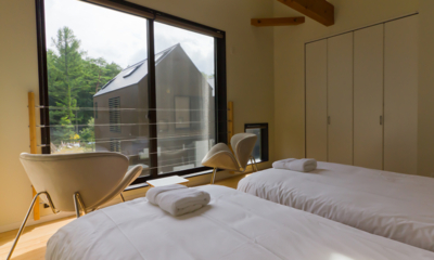 Gakuto Villas Bedroom with Twin Beds and Outdoor View | Hakuba, Nagano