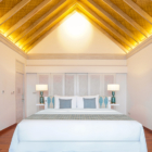 Amaya Kuda Rah Water Villa Bedroom | South Ari Atoll, Maldives