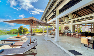 Alta Vista Pool Side Fireplace and Sun Beds | North Bali, Bali