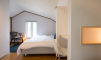 Kuma Cabin Bedroom with Seating | Hirafu, Niseko