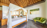 Villa Nature Guest Bedroom with Green Couch | Ubud, Bali