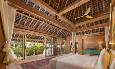 Blue Karma Villas Umalas Villa Kayu Master Bedroom with Wooden Floor and View | Umalas, Bali