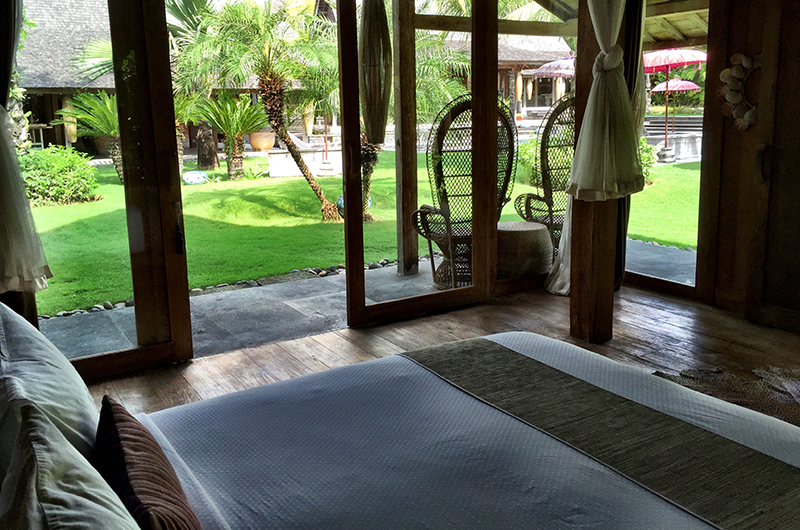 Blue Karma Villas Umalas Villa Kayu Bedroom with Wooden Floor and Garden View | Umalas, Bali