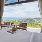 Avasara Residence Bedroom with Seating Area and Sea View | Bophut, Koh Samui