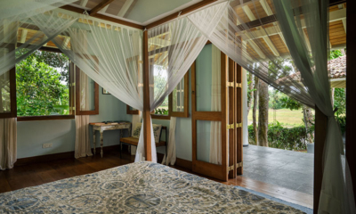 Boundary House Bedroom One with Four Poster Bed and View | Galle, Sri Lanka