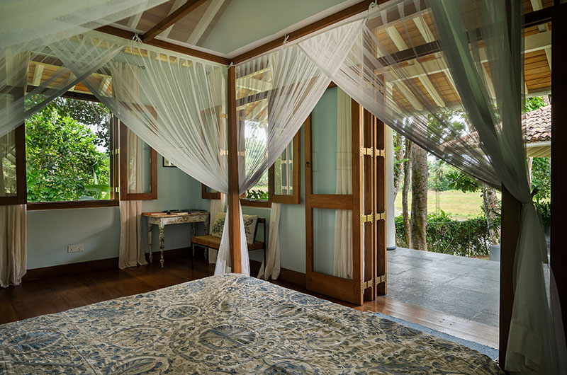 Boundary House Bedroom One with Four Poster Bed and View | Galle, Sri Lanka