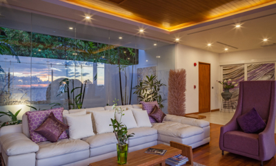 Villa Solaris Lounge Room with Wooden Floor at Night | Kamala, Phuket