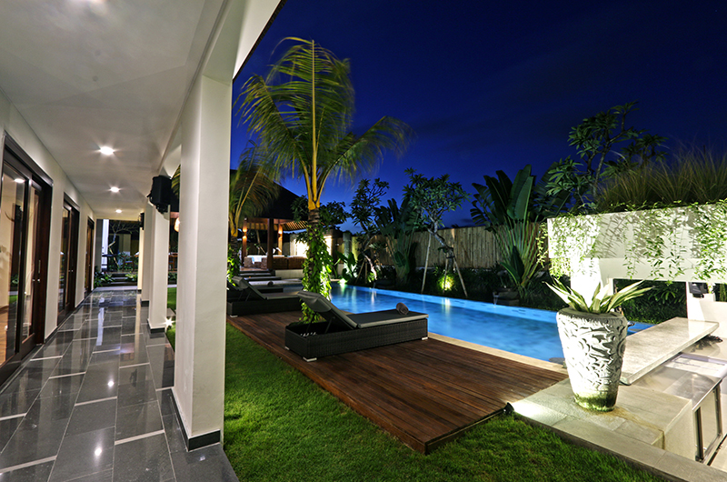 Villa Elite Cassia Pool Side Area at Night | Canggu, Bali