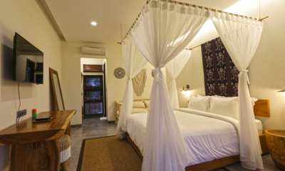 Villa Elite Cassia Bedroom with Four Poster Bed and TV | Canggu, Bali